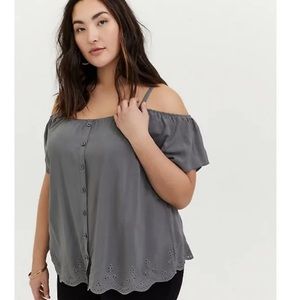 Cold shoulder blouse.